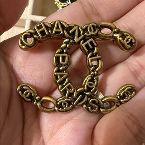 Elegant Gold Logo Brooch